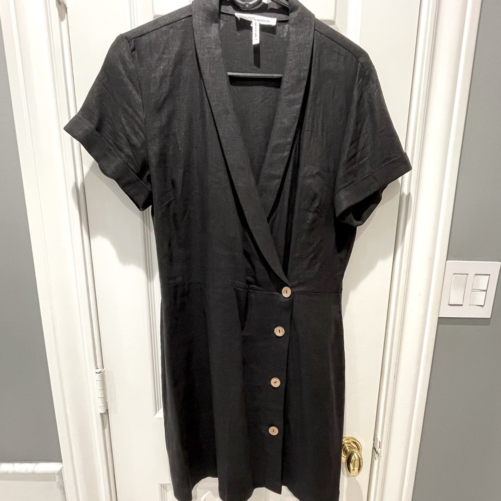 NWOT black linen shirt dress with wooden like side buttons.